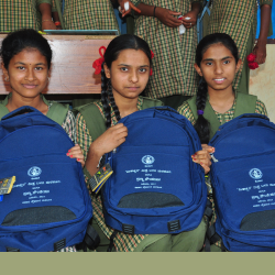 Students Receiving School Bags