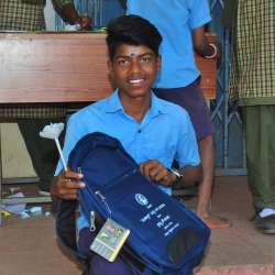 Students Receiving School Bags
